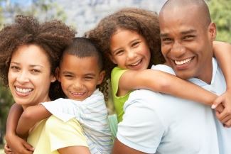 Family of 4 Hugging